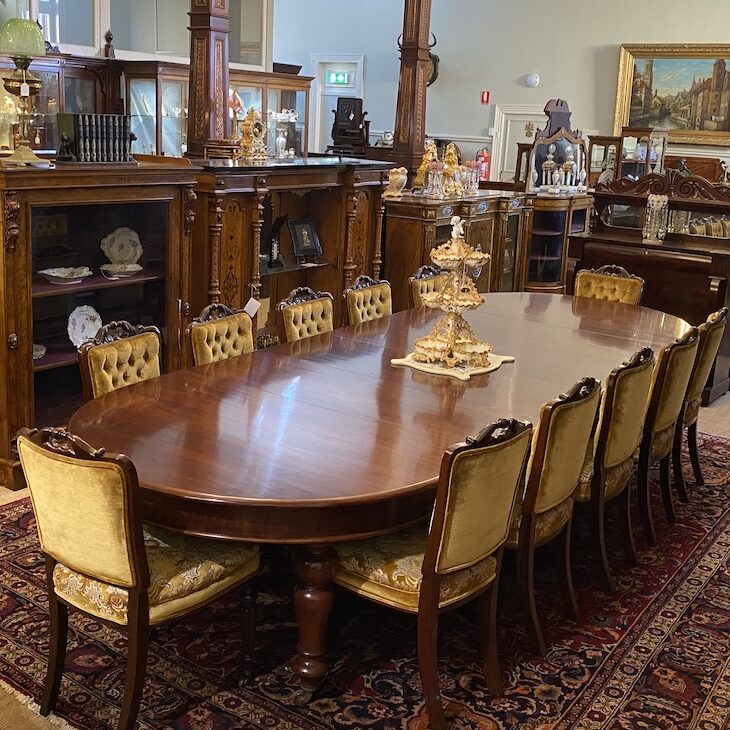 Antique dining set in grand dining room